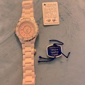 Brand new.  Light Pink Watch.  Genuine Sapphire Crystal.